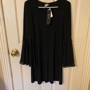Brand new “MSK” brand silky dress.  Black with fluted sleeves.  Flared.